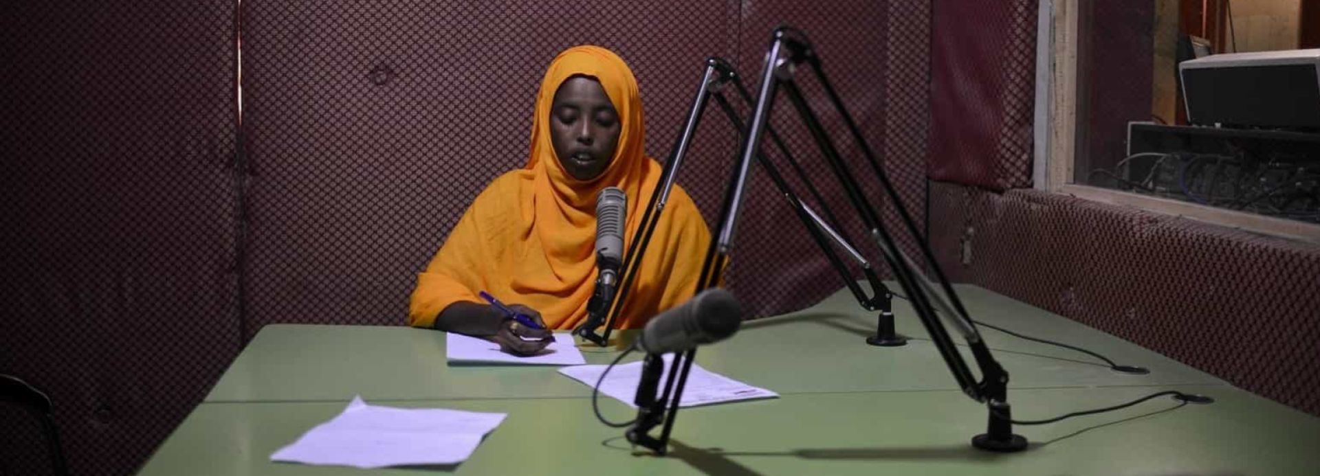 Newsreader in Radio Mogadishu.  ©Tobin Jones/Albany Associates.
